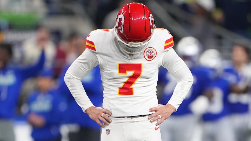 Kansas City Chiefs' Harrison Butker reacts after missing a field goal attempt during the...
