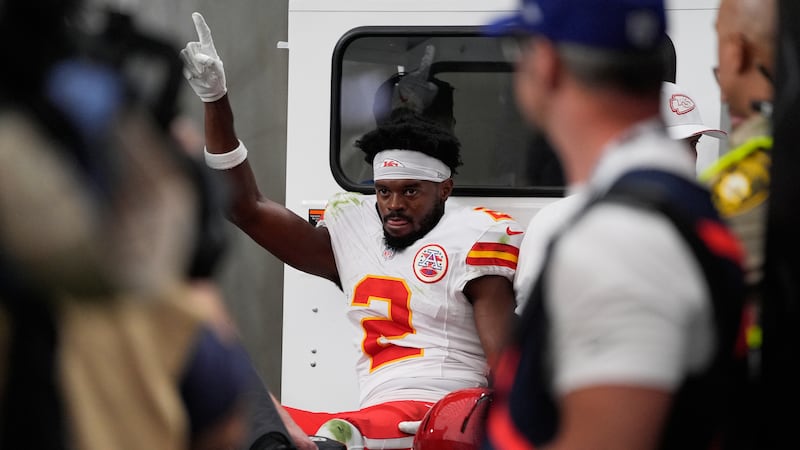 Kansas City Chiefs wide receiver Tyquan Thornton (2) waves as he is carted off the field after...