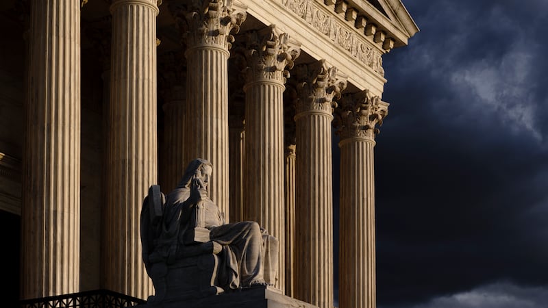 FILE - The Supreme Court is seen at dusk in Washington, Oct. 22, 2021. The Supreme Court is...