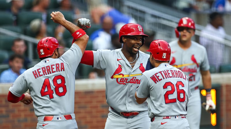 Walker, Church and Burleson hit homers and Cardinals ride 7-run 7th inning to win over Braves