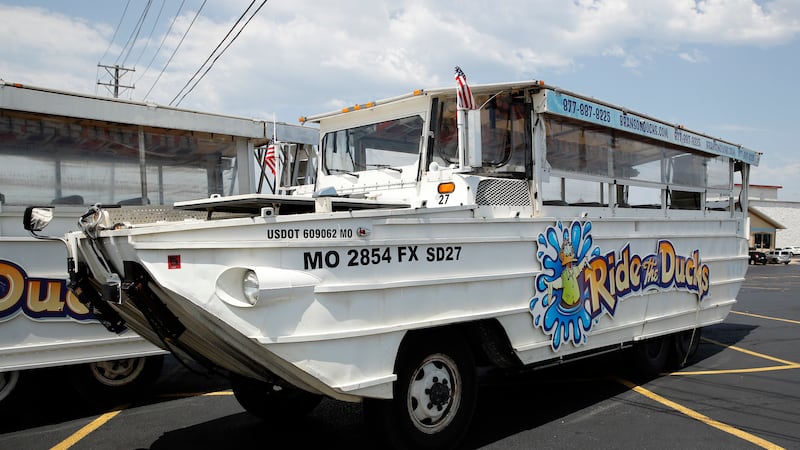 FILE - In this July 20, 2018, file photo, a duck boat sits idle in the parking lot of Ride the...