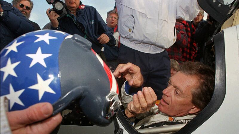 FILE -Former land speed record holder Craig Breedlove reaches for his helmet prior to making...