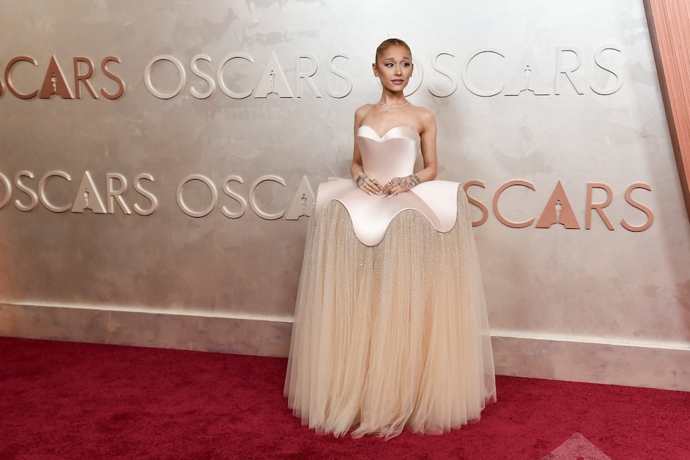 Ariana Grande goes full Glinda and other stars stun in bold red and classic black on Oscars carpet Ariana Grande goes full Glinda and other stars stun in bold red and classic black on Oscars carpet