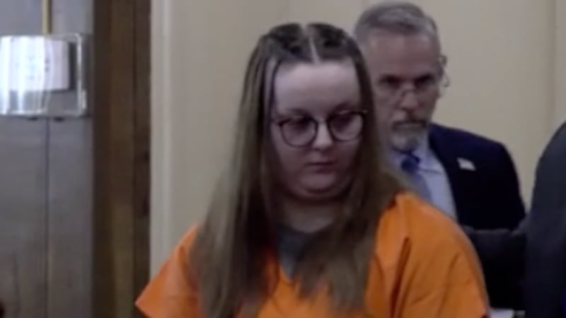 Kourtney Aumon appears in court in Benton County, Mo.