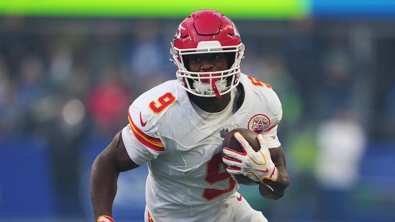 Kansas City Chiefs running back Kenneth Walker III runs the ball during the first half of an...