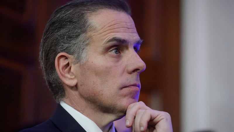 FILE - Hunter Biden listens while his father, President Joe Biden, speaks during a Hanukkah...