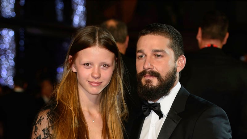 FILE - Mia Goth, left, and Shia LaBeouf appear at the premiere of the film "Fury," during the...