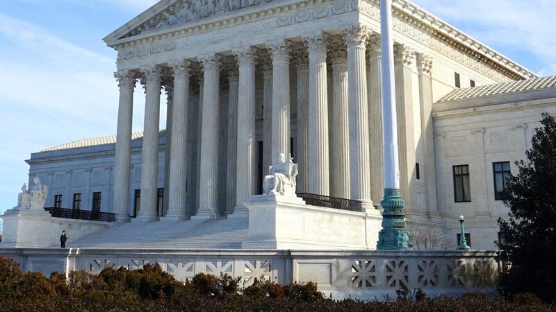 The Supreme Court said Monday it would review a challenge to a California law that set certain...