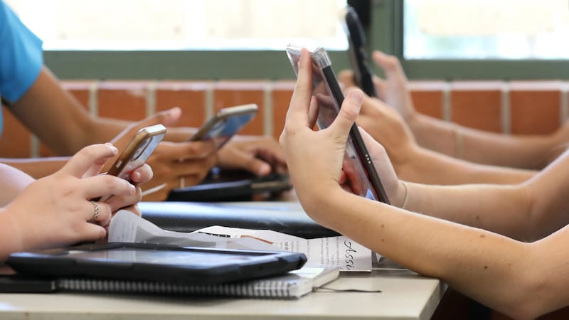 Phones in pockets, televisions playing in the background, and social media feeds within reach...